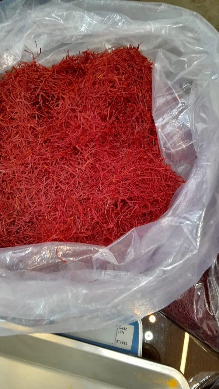 Bulk saffron in a protective bag resting on a weighing scale
